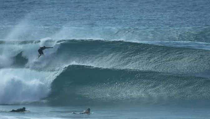 surfing big waves