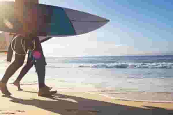 surfers on the beach