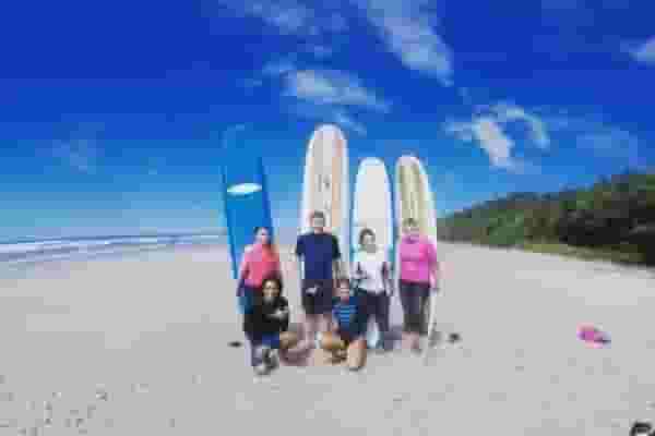 surfers on the beach