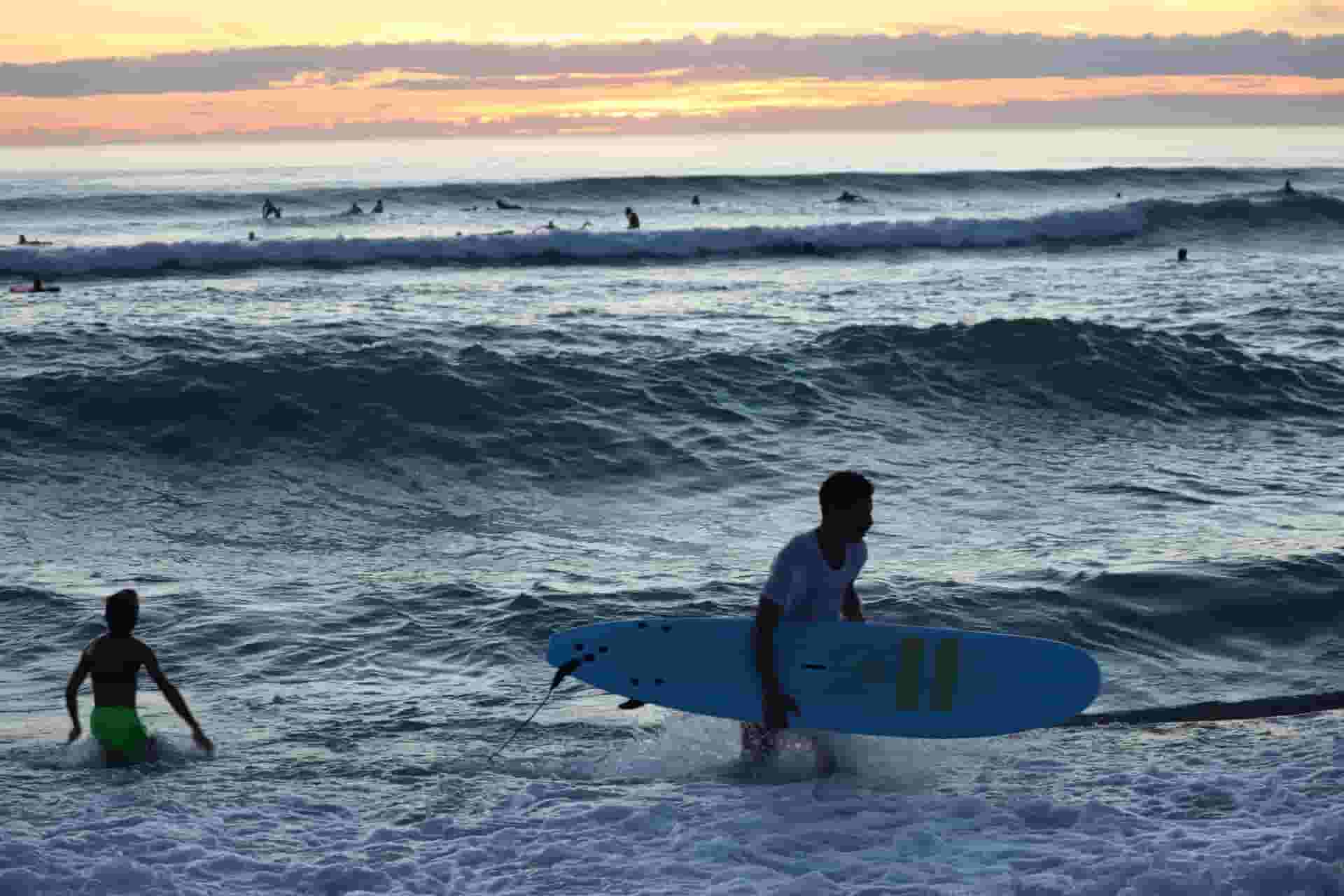 surfers in water