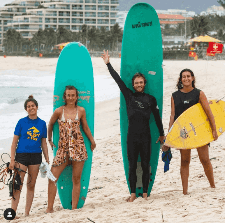 surfers on the beach