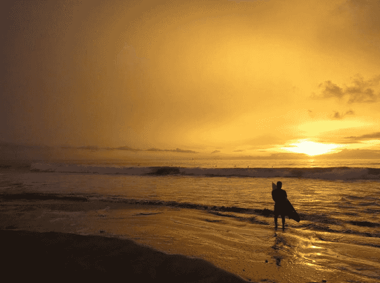 surfer in the sunset