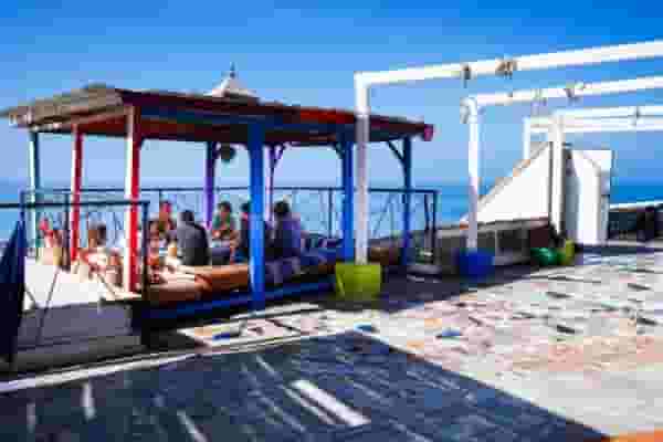 eating taginhe on roof top