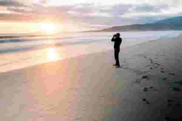 digital nomad on the beach in Galicia