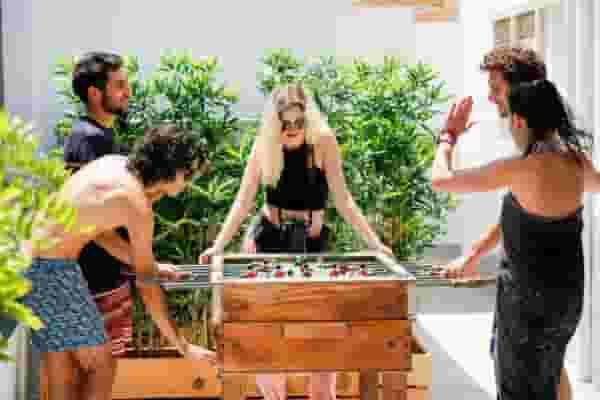 digital nomads playing fussbal