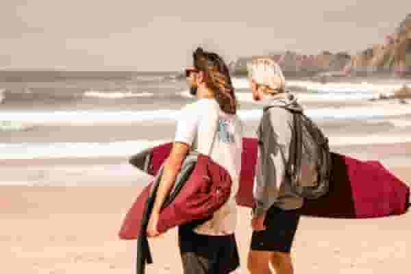 digital nomads checking out the waves