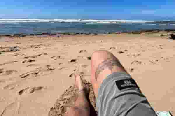 digital nomad on the beach