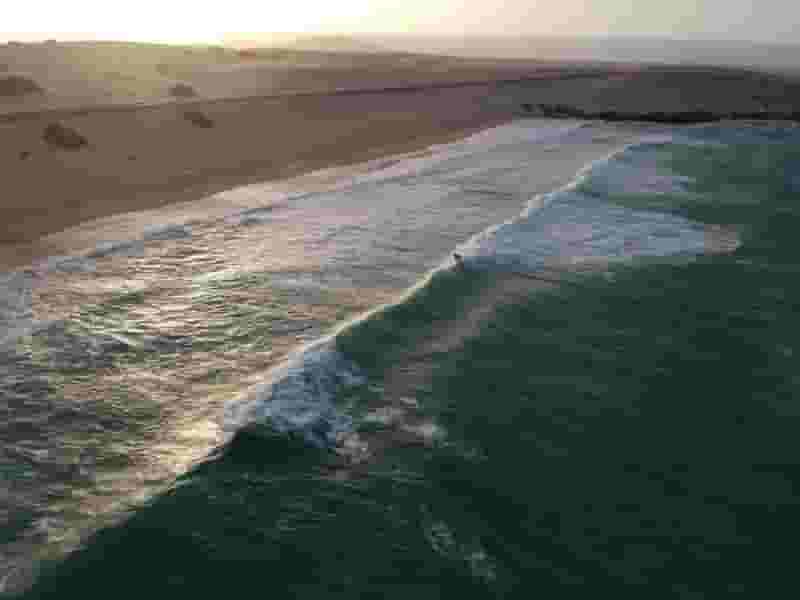 drone shot of surfer