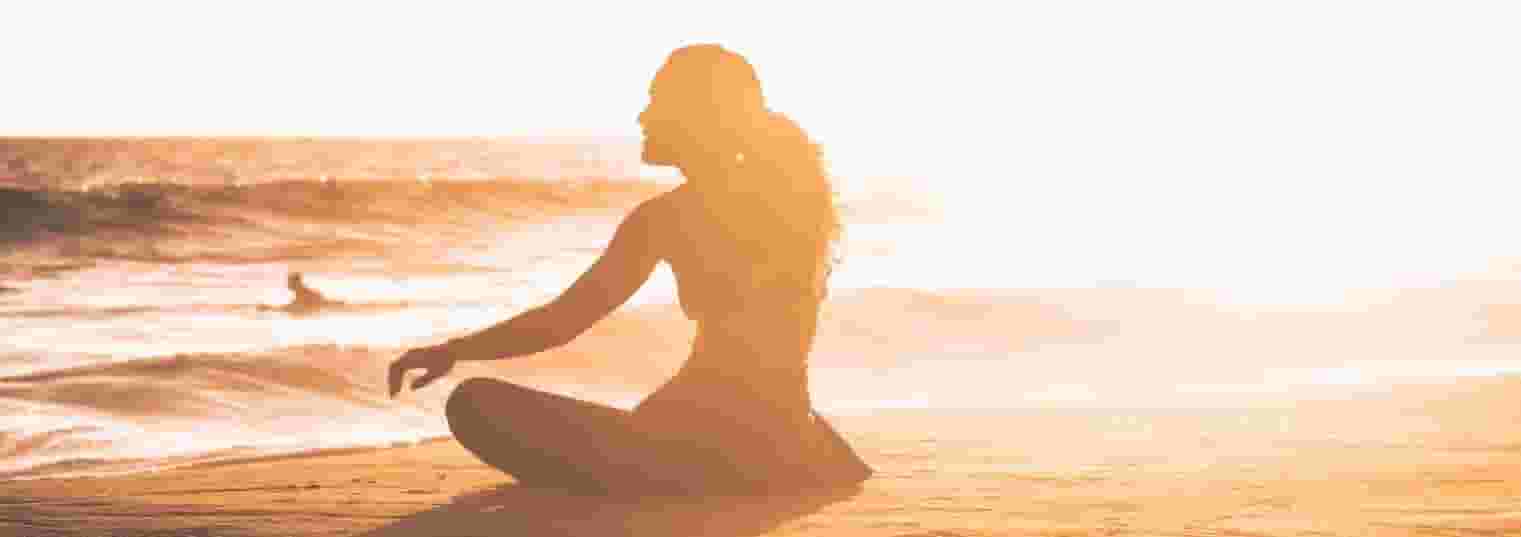 meditating on the beach