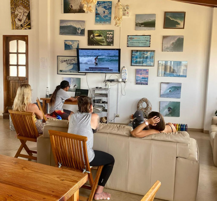 remote workers watching a surf competetion