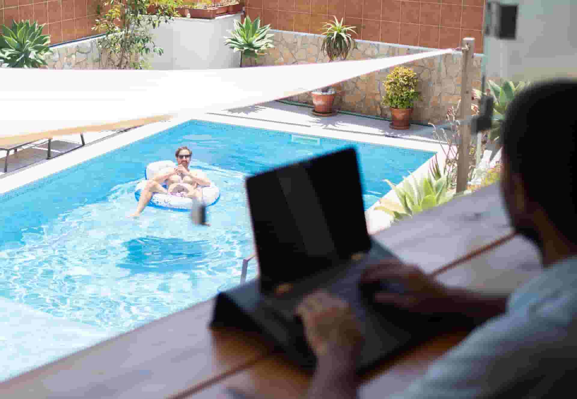 working next to the pool
