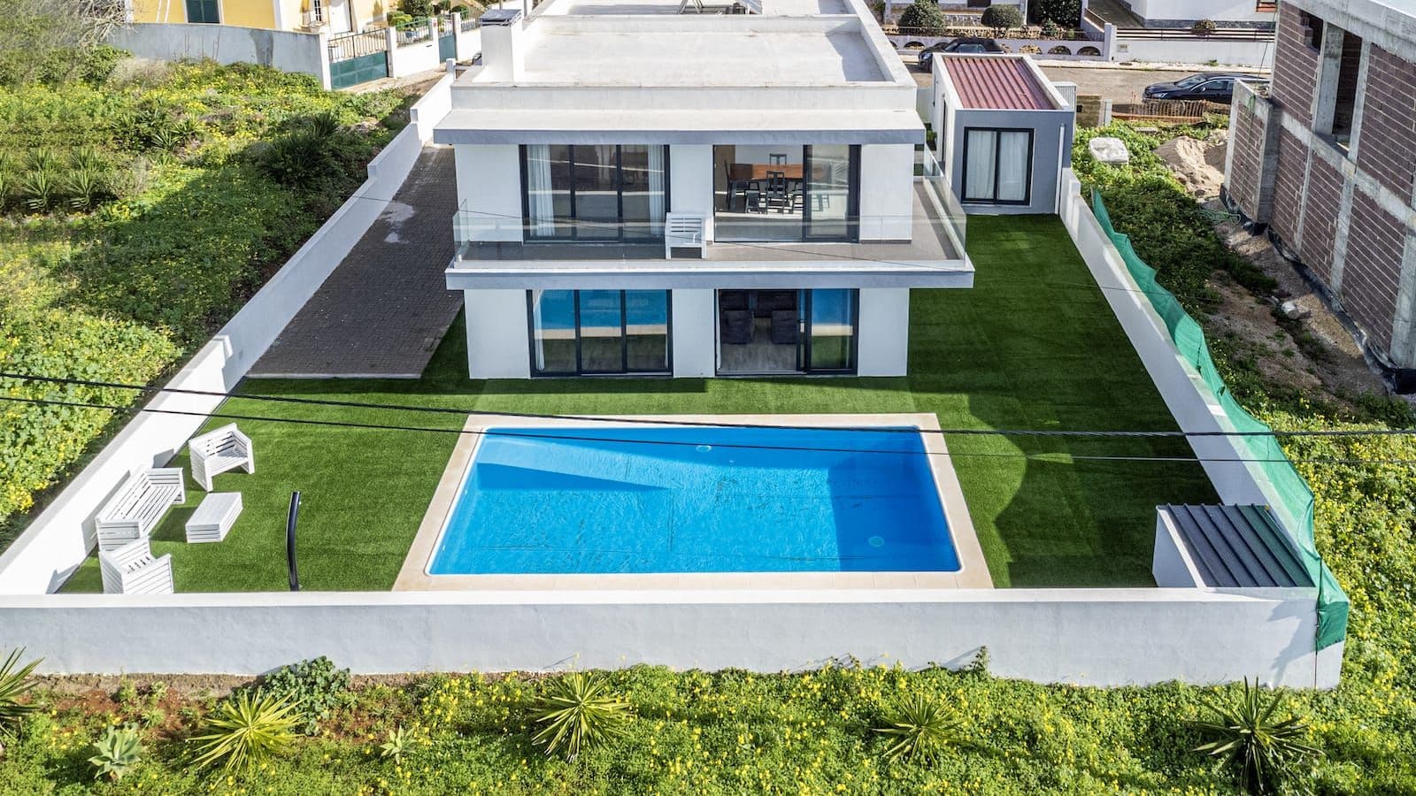 Long term nomad surf house with pool and ocean views in Ericeira, Portugal at Helder's House