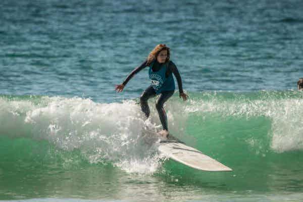 women beginner surfer