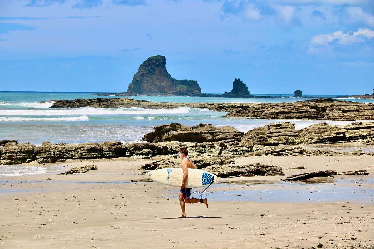 surfer in playa maderas